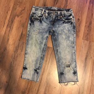 Distressed acid wash jean capris